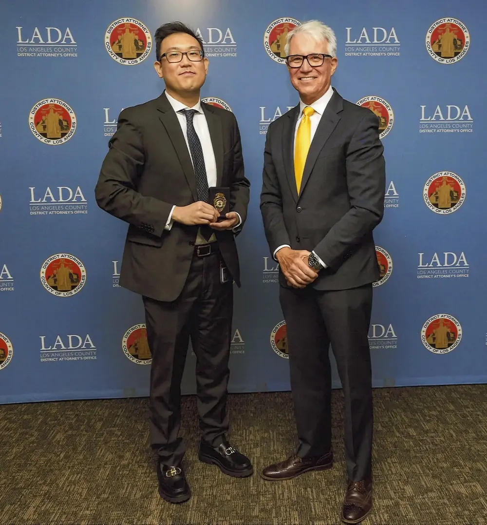 Attorney Andrew Jang with district attorney George Gascon